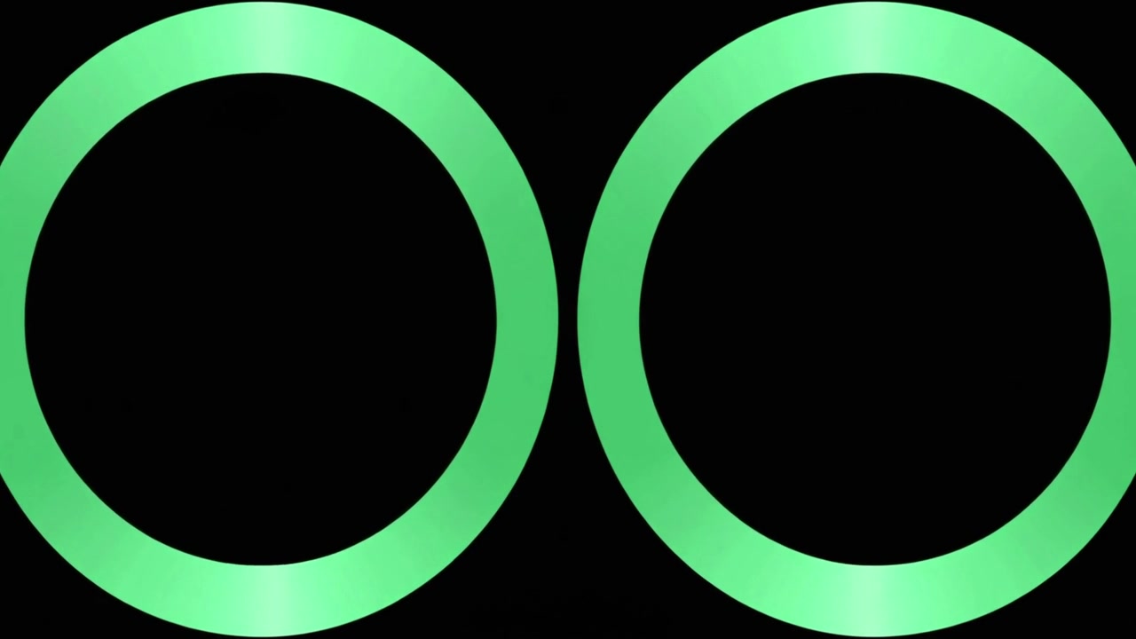 Twee gloeiende groene cirkels die uitzetten en inkrimpen op een zwarte achtergrond