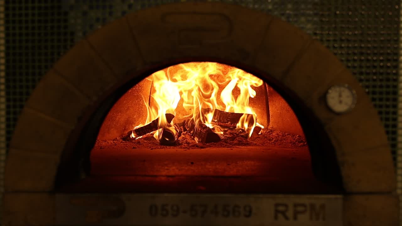 Fire burning in a pizza oven
