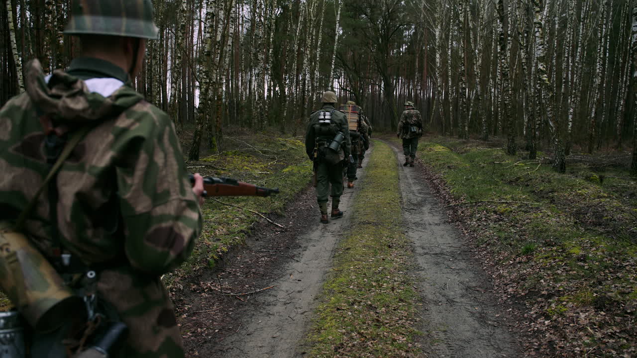 German Soldiers on a Path in a Forest