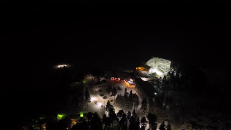 aerial view circling the bomba resort, cold, winter evening in nurmes, finland