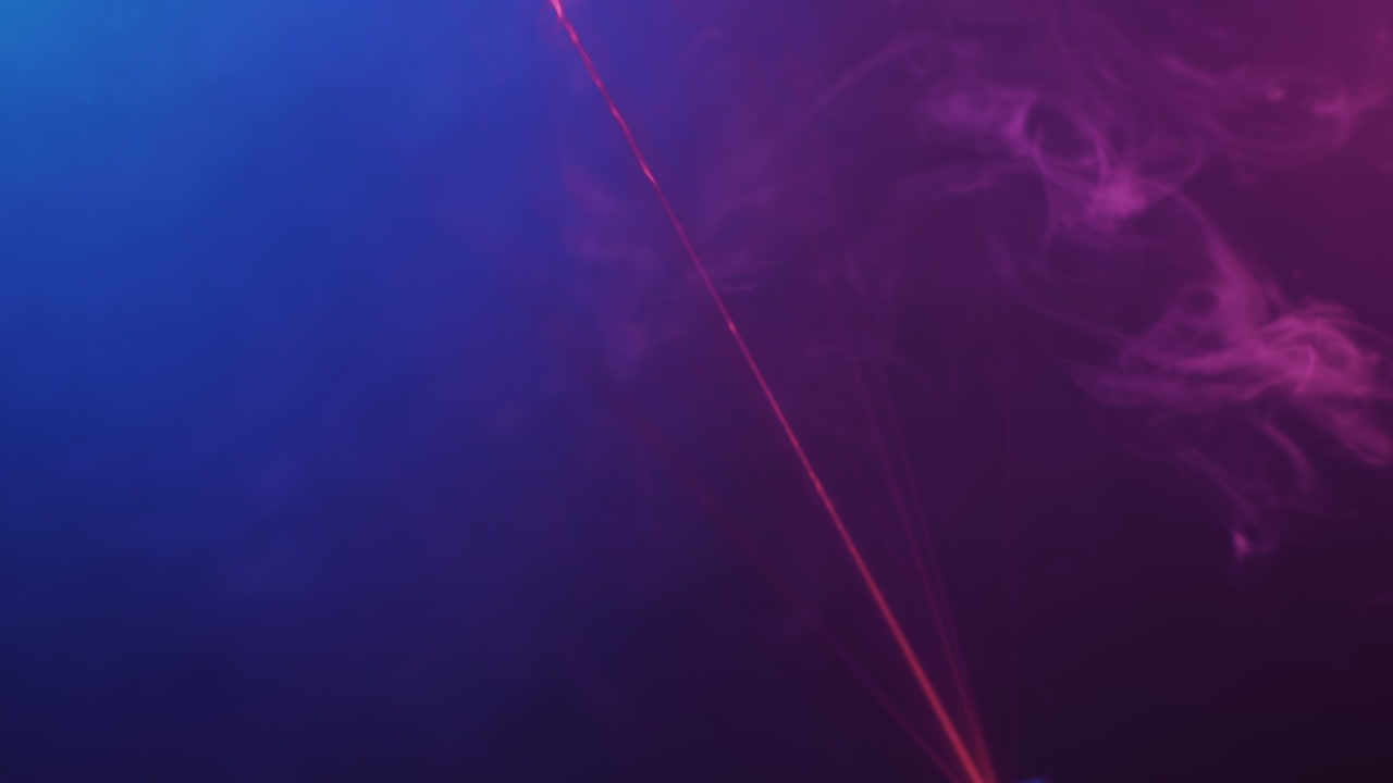 Pink and Green Laser Lights in Neon Nightclub