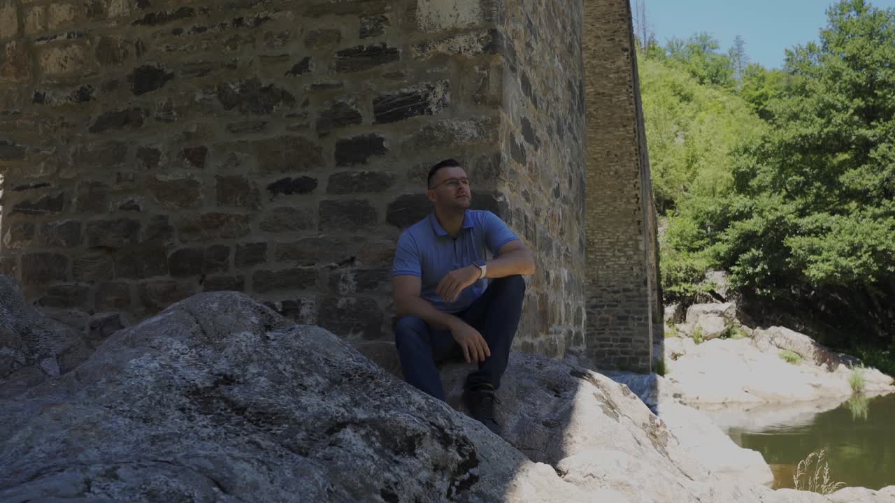 Pedestal shot from the Arda River going up to the Devil's Bridge, located near the Rhodope Mountains in Ardino, Bulgaria
