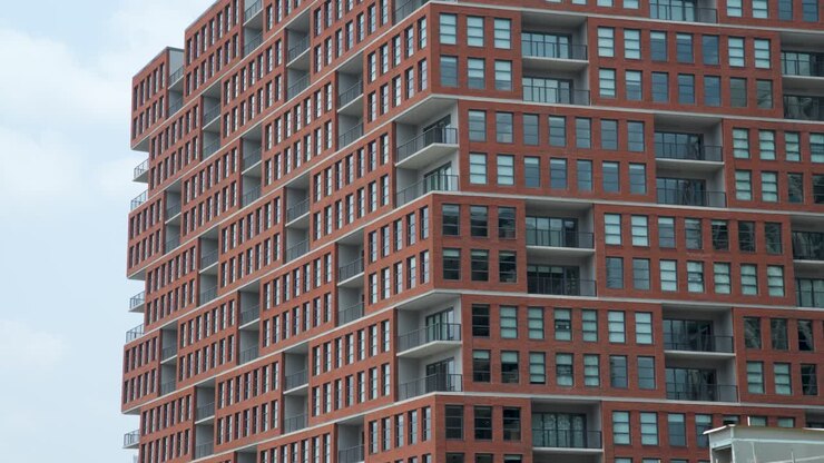 Medium shot of a brick apartment building