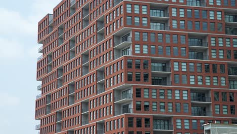 medium shot of a brick apartment building