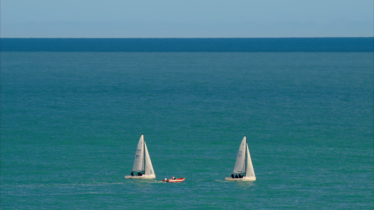 Aerial view of two ships moving on the sea in Monaco