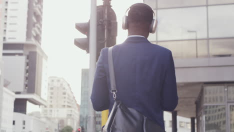 fun businessman enjoying listening to music