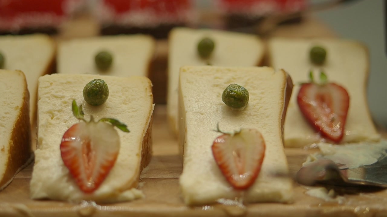 Gourmet Strawberry and Pea Canapés on a Wooden Board
