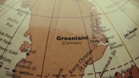 close-up of a globe showing greenland