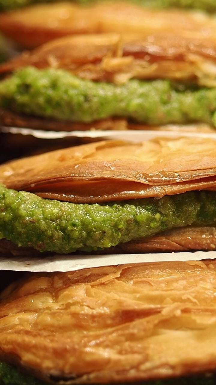 Delicious Golden Flaky Pastries with Green Pistachio Filling