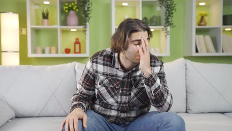 depressed young man trying to be happy.