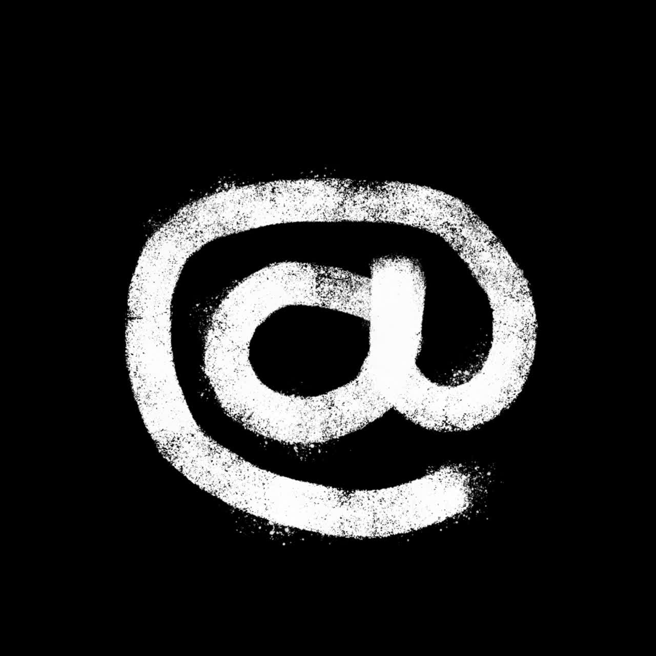 White Chalk At Symbol on Black Background