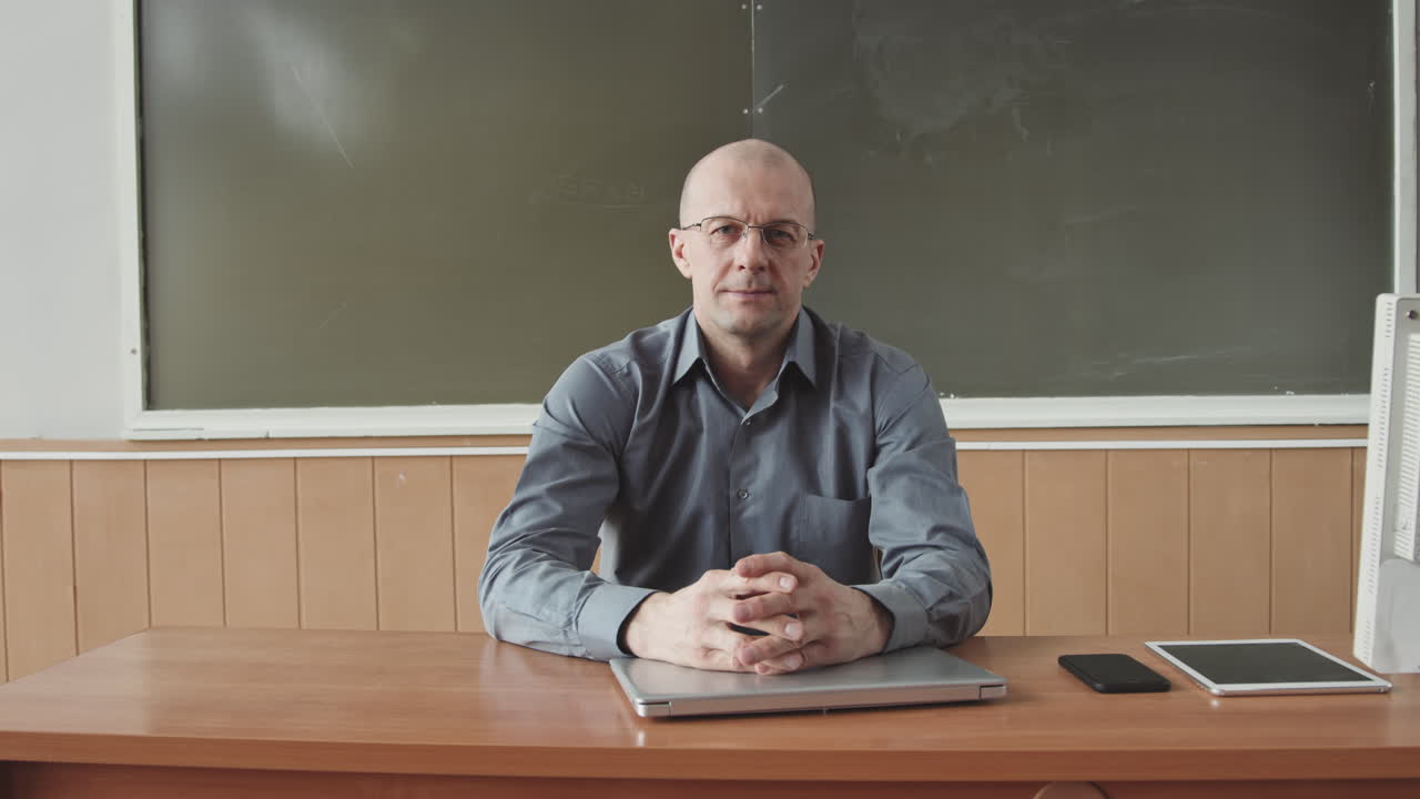 Portrait of Male University Professor with Laptop