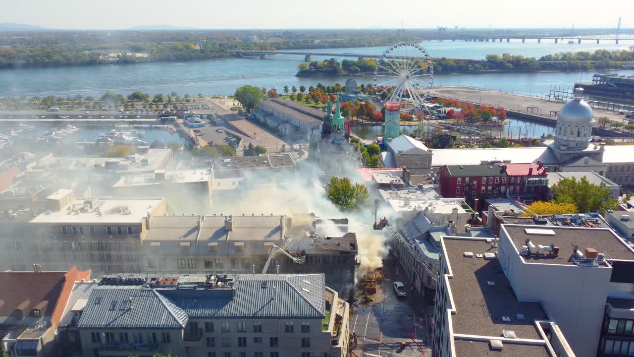 Burning building in downtown Montreal, aerial drone view