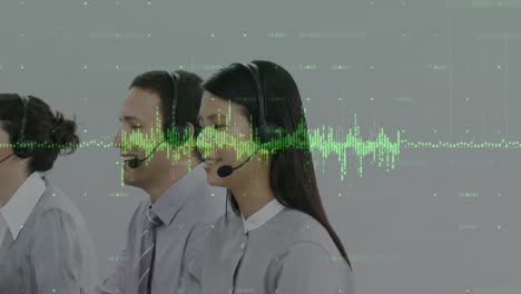 Animation-of-data-processing-over-business-people-using-phone-headsets