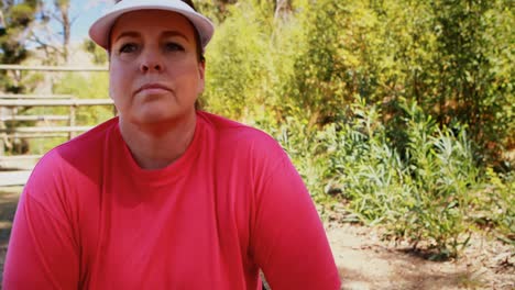 woman exercising during obstacle course