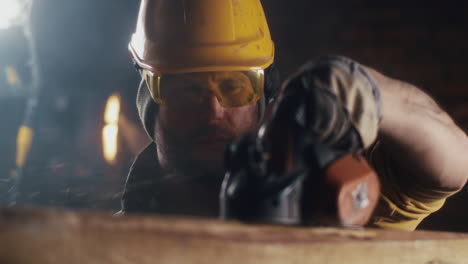 carpenter using a planer on wooden beam