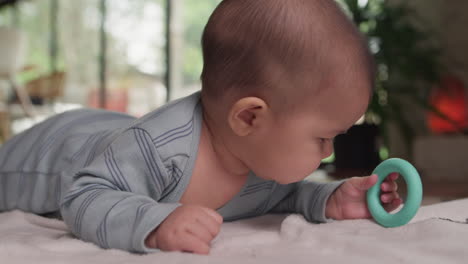 cute baby self soothing with teething toy