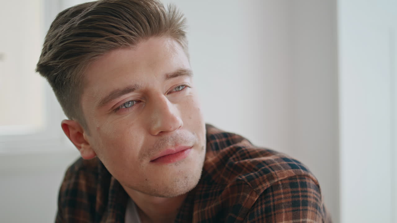 Portrait young man communicating on date. Handsome smiling guy listening partner