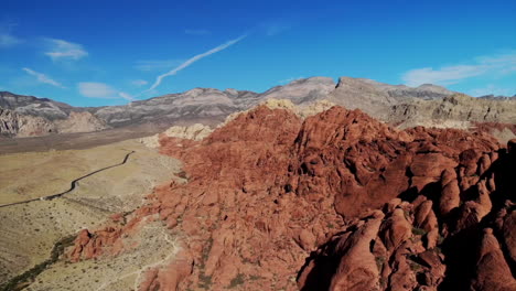 drone shot of red mountains at red rock canyon park near las vegas