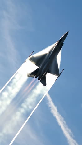 fighter jet with contrails in blue sky