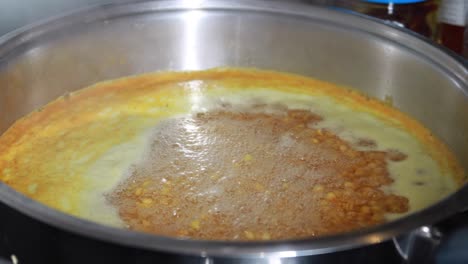 Slow-motion-of-cooking-dhal-in-hot-water