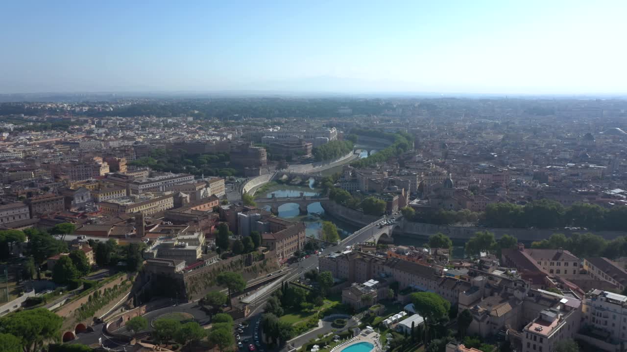 Amazing aerial drone flying over Castel Sant’Angelo, the Mausoleum of Hadrian, with the Tiber River and Rome’s skyline, highlighting the city’s rich history and timeless architecture