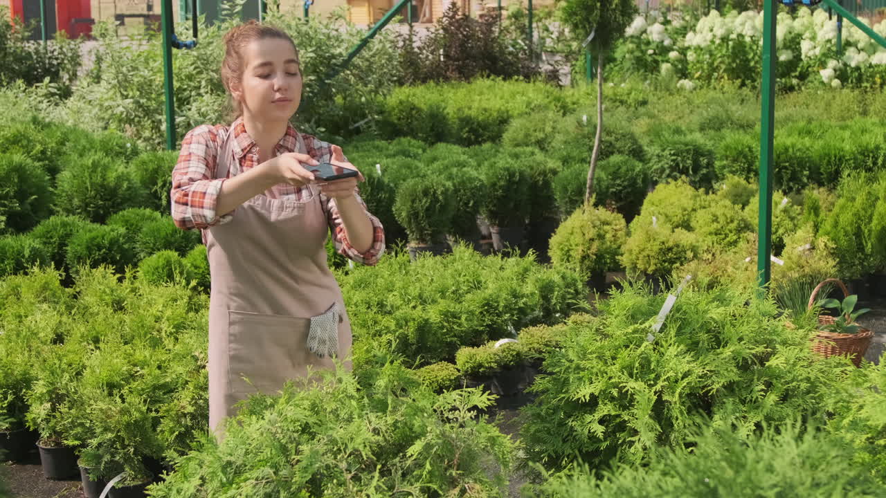 Woman working in a garden center