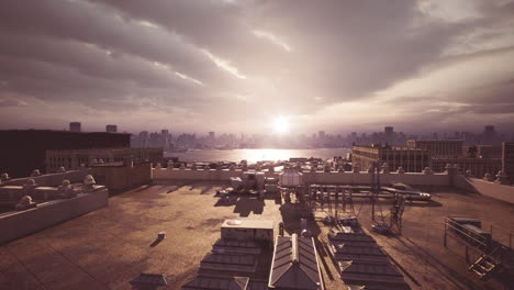 golden sunset over city skyline from rooftop view during evening hours