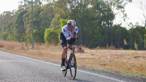 close up of elite athlete cyclist racing bike