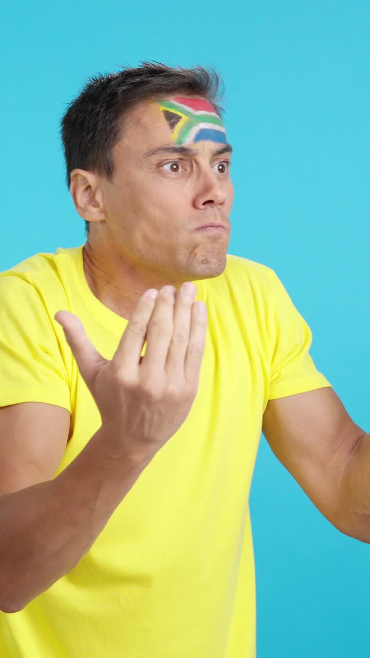 Man cheering for South Africa, angry with the decision of referee