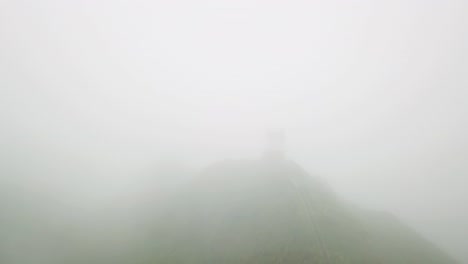 aerial footage of the trail leading up the haiku stairs, or stairway to heaven, on oahu, hawaii.