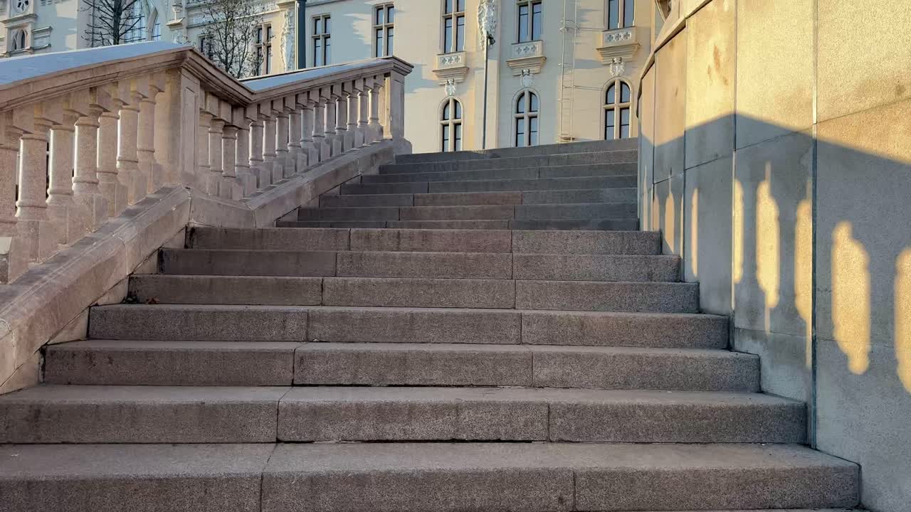 Palace of Culture view from staircase during sunset.