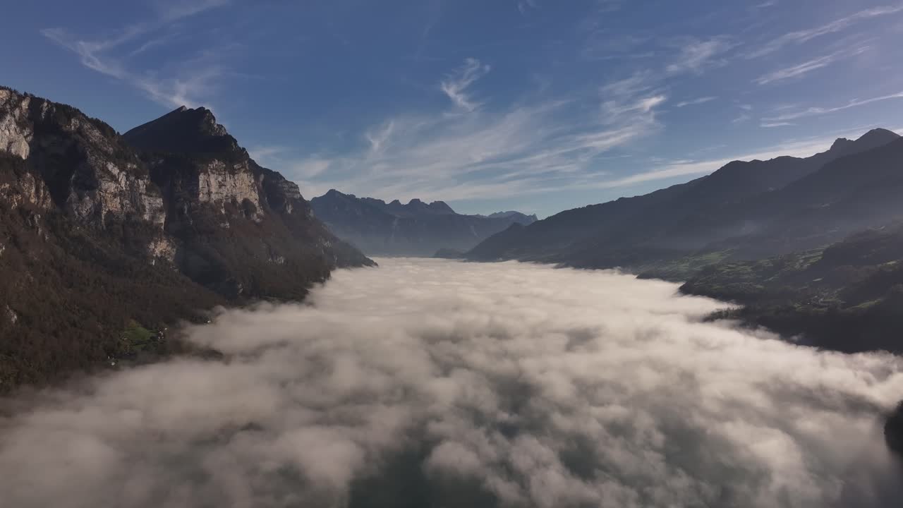 Bird's-eye view over a beautiful sunrise above Lake Walensee, Switzerland.
