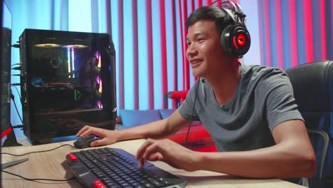 happy gamer playing video games