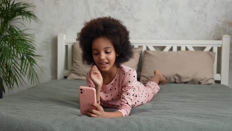 girl on phone in pajamas