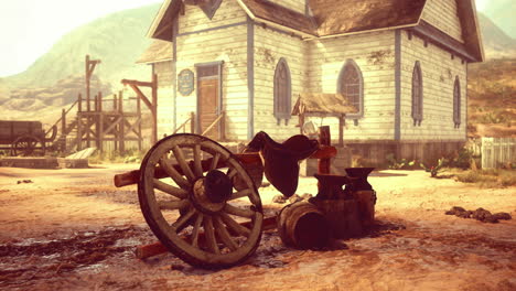 old western town with a rustic cart and church under bright sunlight