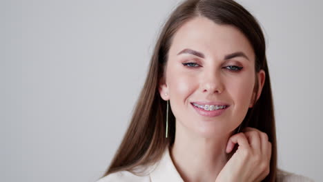 woman with braces smiling