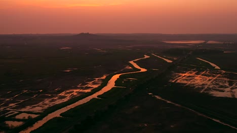 Scenic-Sunset-In-Suburban-Area-Of-Vasai-Near-Mumbai,-India---aerial-drone-shot