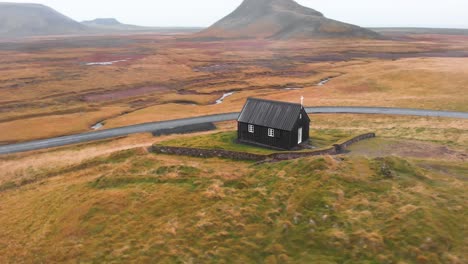 traditional wooden church in krysuvik autumn landscape, iceland