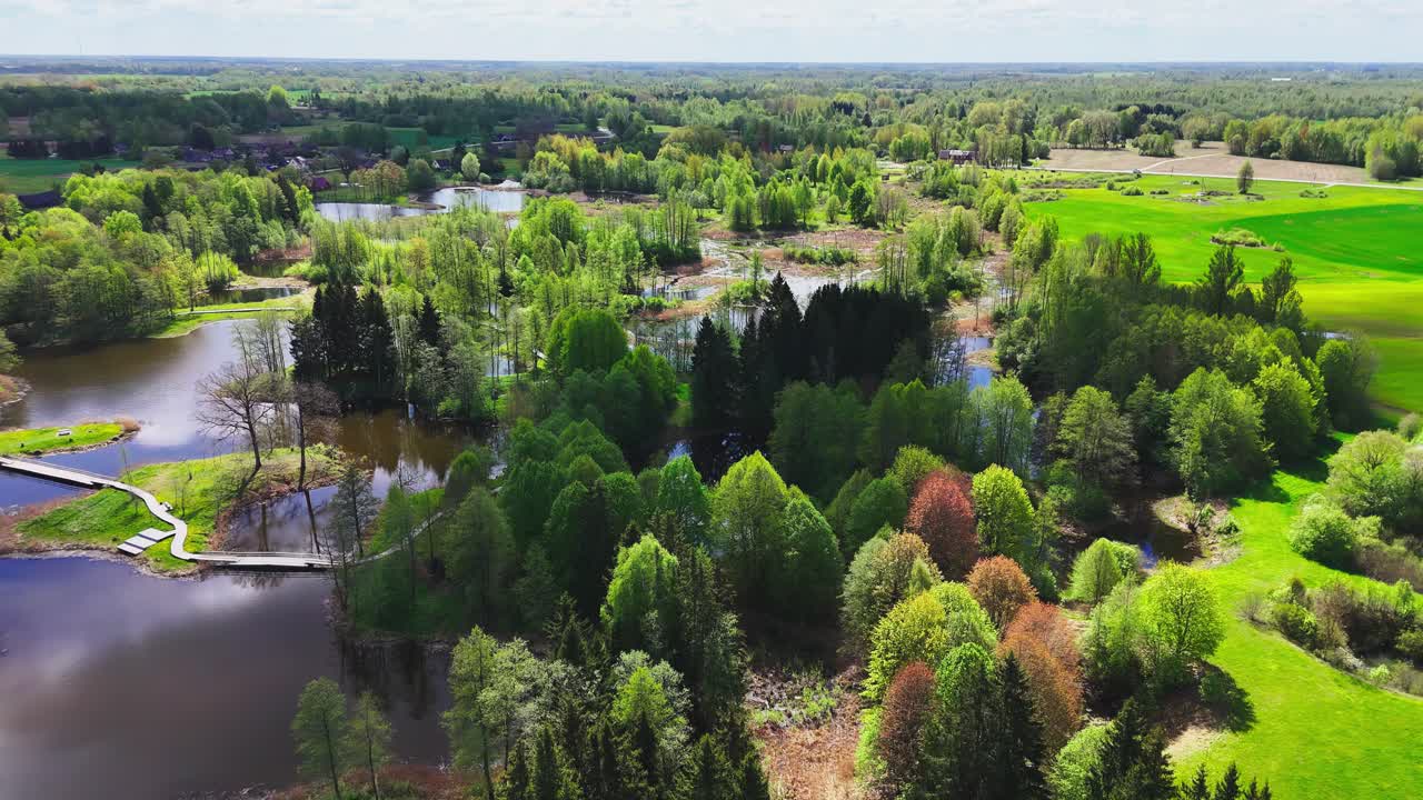 Kirkilai, Biržai Regional Park, Lithuania - A Scenic Area of Karst Lakes, Forests, and a Canoe-shaped Tower - Aerial Drone Shot