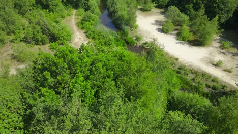 Aerial-Reveal-Stone-Path-Over-the-Water,-Journey-to-Reach-Your-Goals