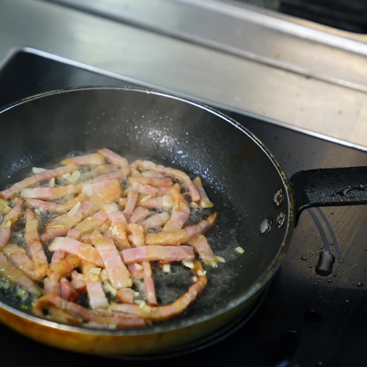 Chef with pan in restaurant