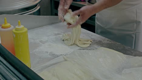 noodle-maker-street-food-in-asia-China-with-flour