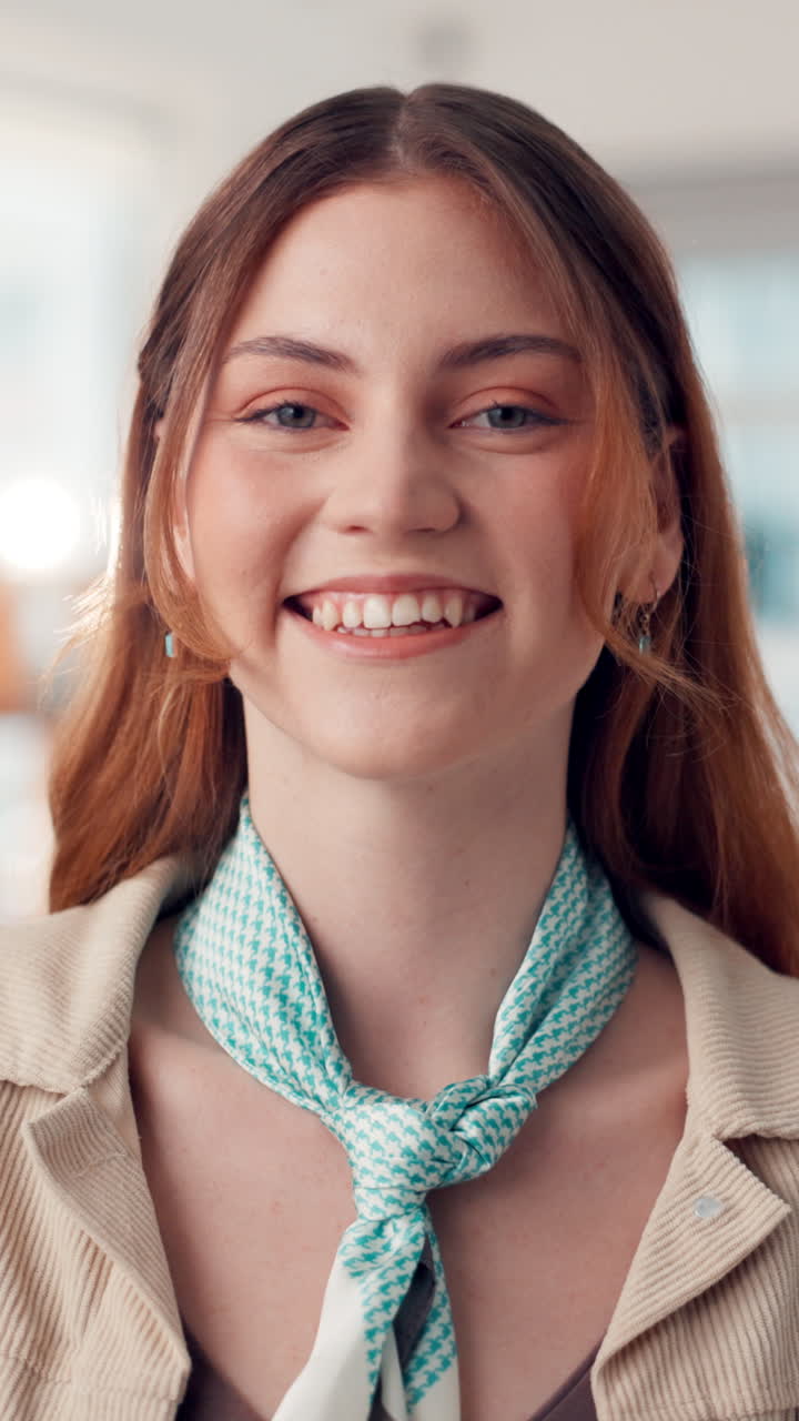 Close-up Portrait of a Happy Young Woman Smiling