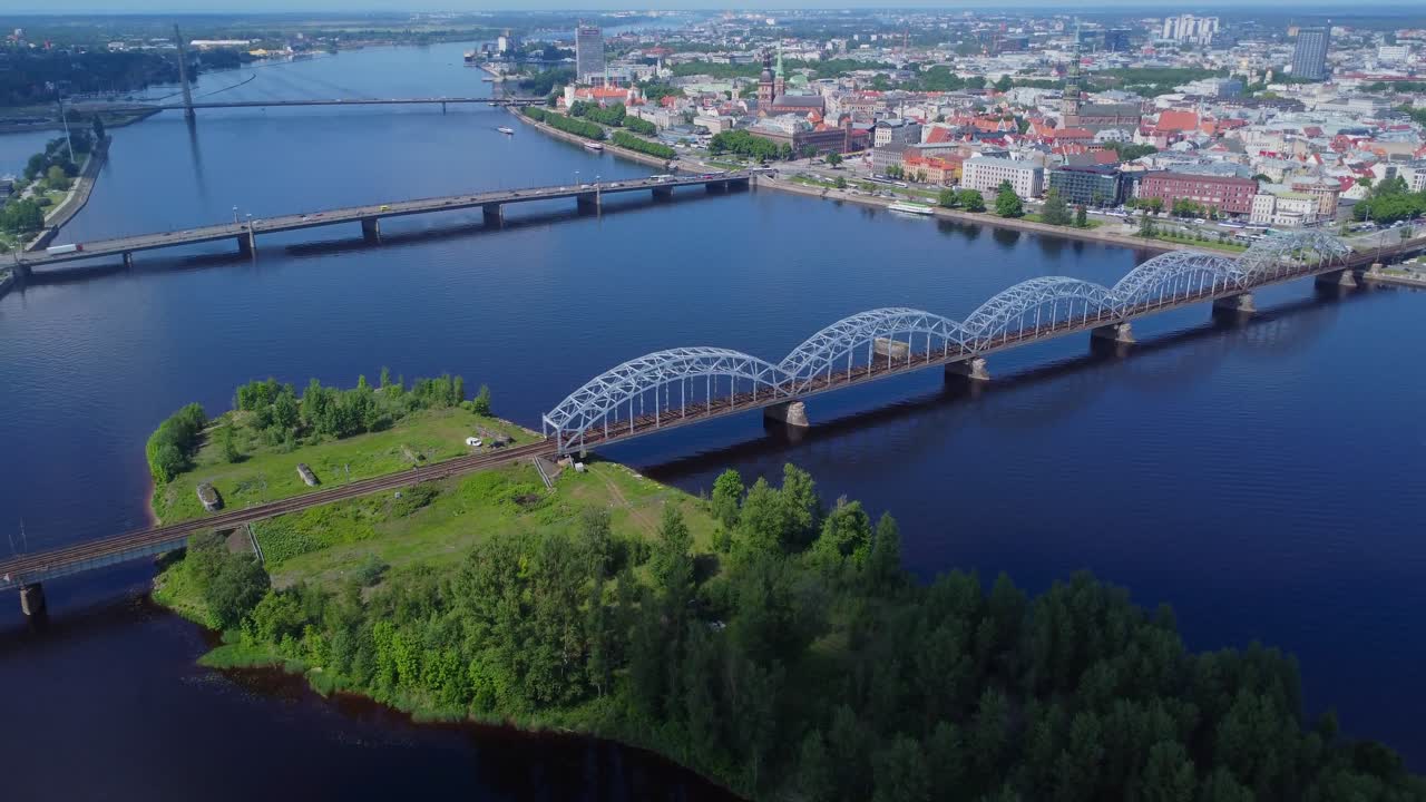 Drone view of Riga Old Town on far side of Daugava River