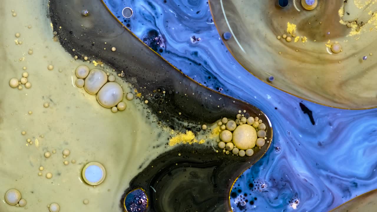 Fantastic abstract paint bubbles moving in slow motion.