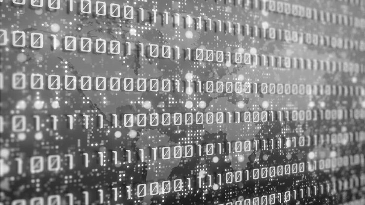 Abstract background with binary computer code. Screen with rapidly changing zeros and ones. Looped animation. Blinking blurred pixel dots.