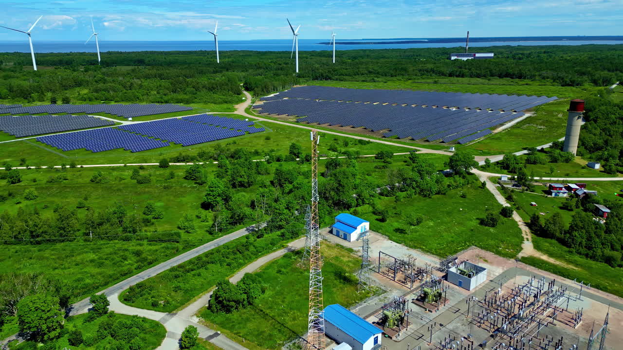 Solar Panels And Wind Turbines Of Paldiski Wind Park In Estonia - Aerial Drone Shot
