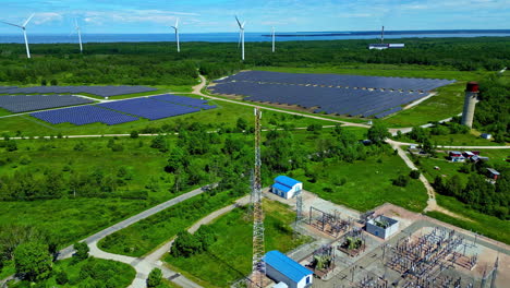 Solar-Panels-And-Wind-Turbines-Of-Paldiski-Wind-Park-In-Estonia---Aerial-Drone-Shot