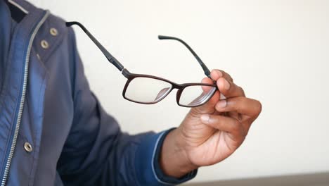 person holding glasses